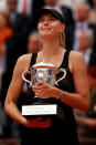 PARIS, FRANCE - JUNE 09: Maria Sharapova of Russia celebrates with the Coupe Suzanne Lenglen in the women's singles final against Sara Errani of Italy during day 14 of the French Open at Roland Garros on June 9, 2012 in Paris, France. (Photo by Clive Brunskill/Getty Images)