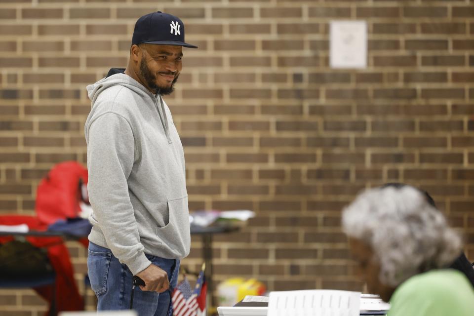 Michael Bankhead is the first voter to arrive as polls open at the McCrorey YMCA to vote in the state's primary election, Tuesday, March 5, 2024, in Charlotte, N.C. (Melissa Melvin-Rodriguez/The Charlotte Observer via AP)