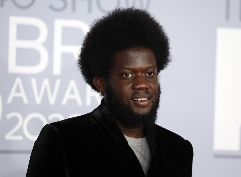 Michael Kiwanuka poses for photographers upon arrival at Brit Awards 2020 in London, Tuesday, Feb. 18, 2020.(Photo by Vianney Le Caer/Invision/AP)