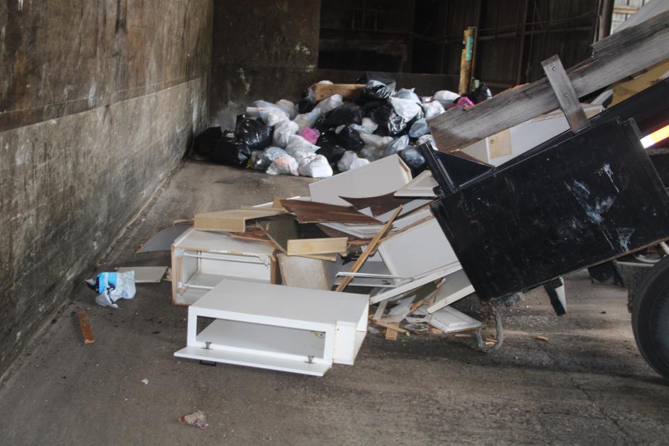 Martinsville's solid waste transfer station takes a wide variety of items from private citizens and commercial businesses for disposal. This contractor removed some cabinets from a home and brought them to the transfer station. The pile of trash bags came from a private trash hauler who dumps them at the transfer station.