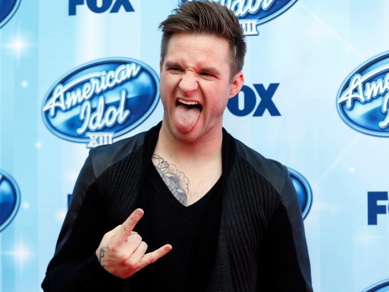 blake lewis posing for a photo on an american idol carpet