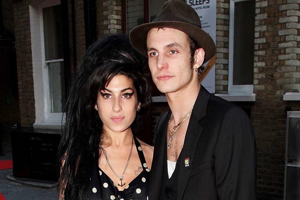 <p>Dave Hogan/Getty </p> Musician Amy Winehouse and her husband Blake Fielder-Civil in June 18, 2007.