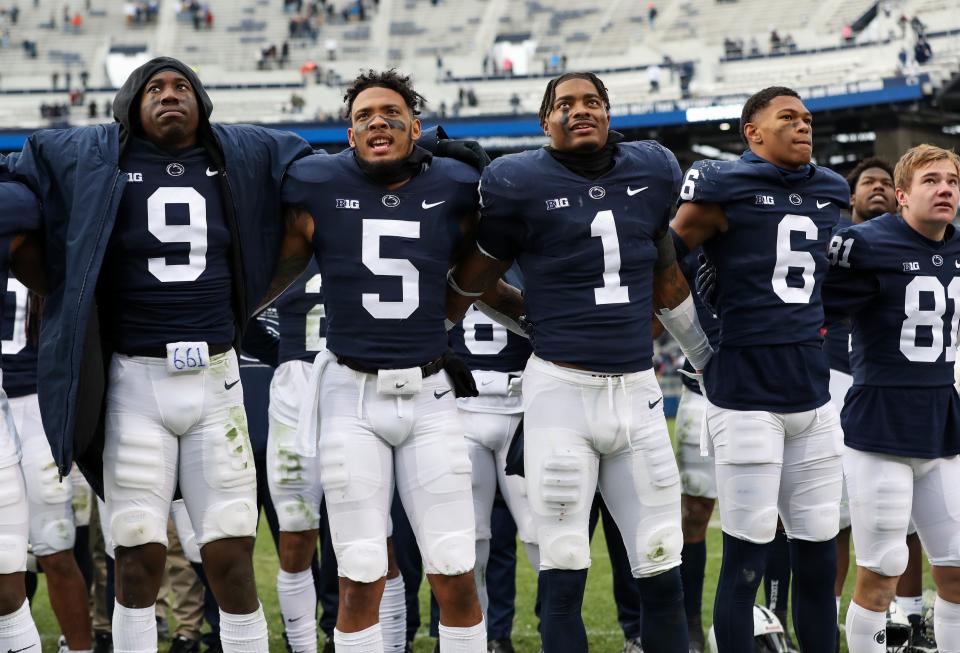 Nov 20, 2021; University Park, Pennsylvania, USA; Members of the Penn State Nittany Lions team sign their alma mater following the game against the Rutgers Scarlet Knights at Beaver Stadium. Penn State defeated Rutgers 28-0. Mandatory Credit: Matthew OHaren-USA TODAY Sports