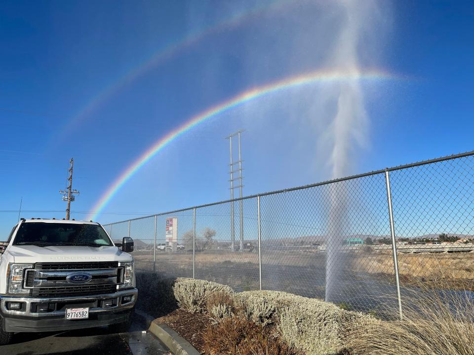 Thousands of residents were drawn to the sight of water spewing high into the air from a broken water line near a shopping center in Hesperia. Many described the sight as a "geyser" or "water fountain," which created a rainbow.