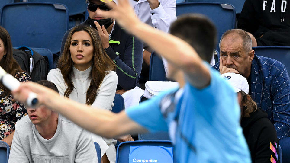 Vanessa Sierra and John Tomic, pictured here watching Bernard Tomic at the Australian Open.