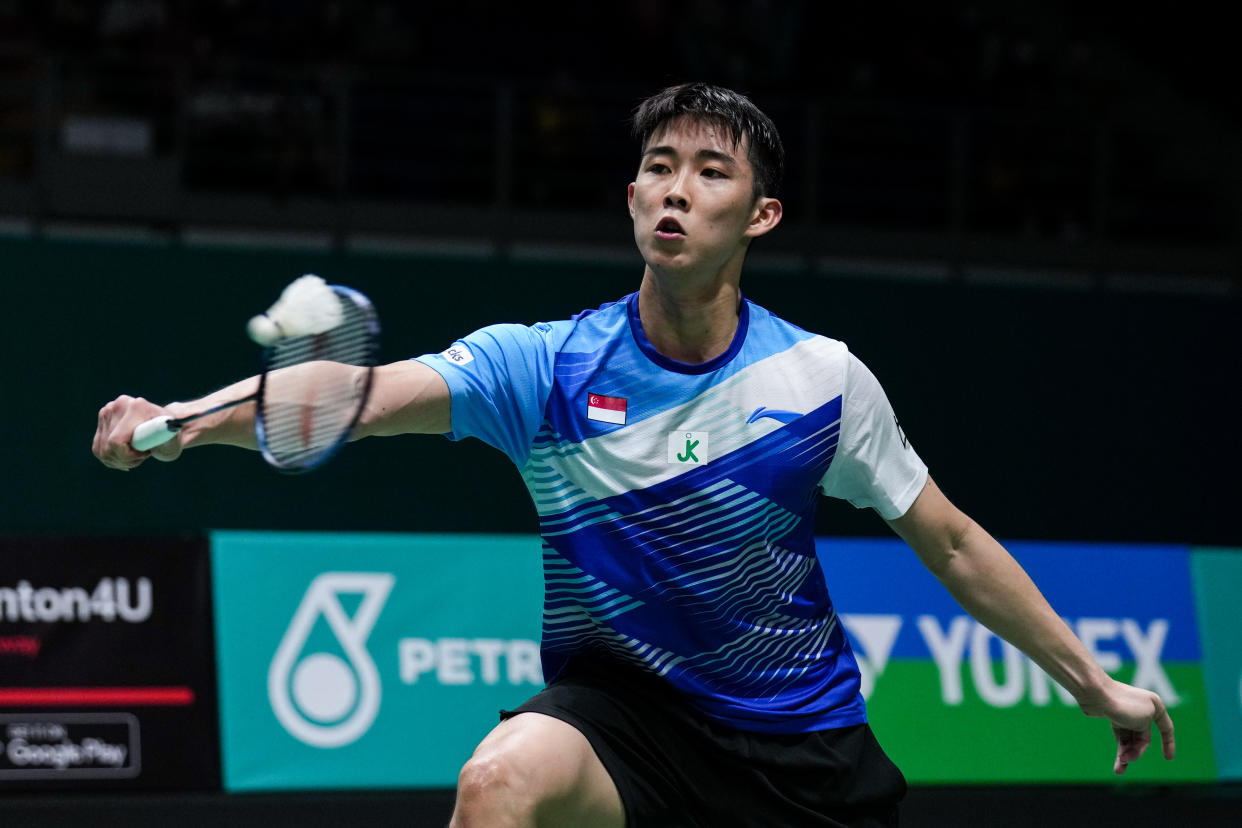 Singapore shuttler Loh Kean Yew retrieves a shot at the Malaysia Open.