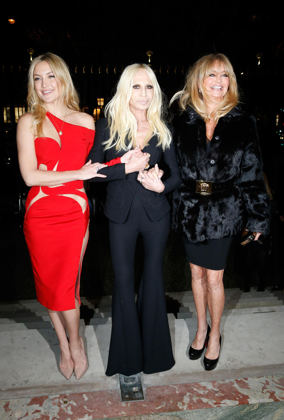 With Kate Hudson and Goldie Hawn at the Versace SS15 show during Paris Fashion Week in 2015