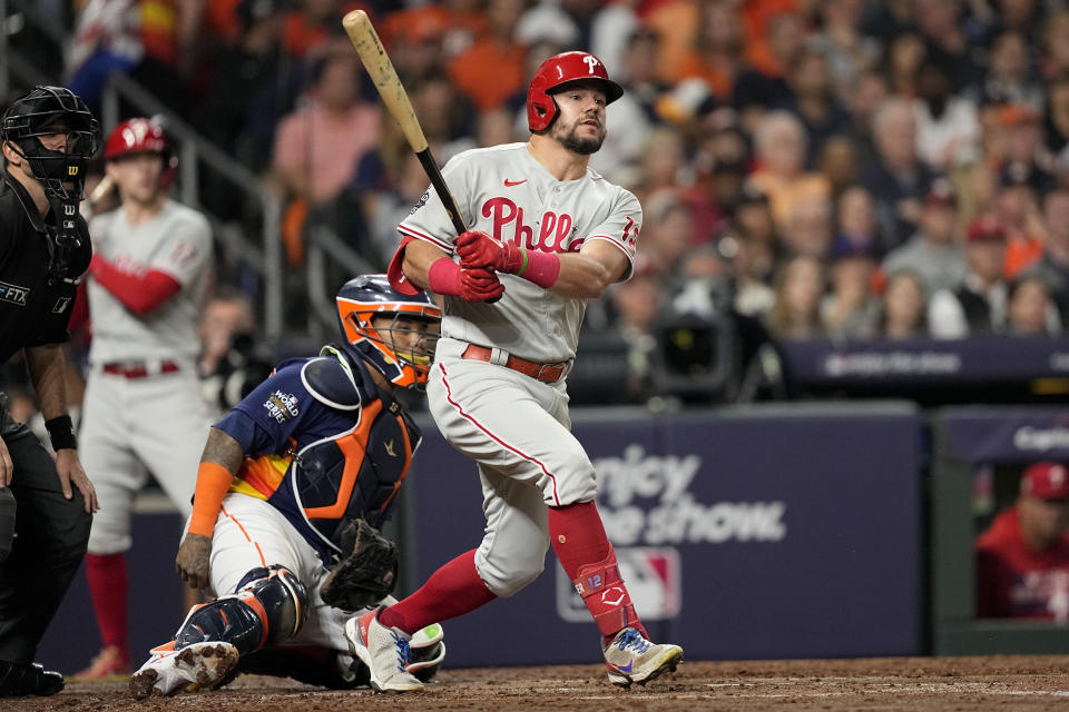 Philadelphia Phillies' Kyle Schwarber runs after hitting a single during the third inning in Game 2 of baseball's World Series between the Houston Astros and the Philadelphia Phillies on Saturday, Oct. 29, 2022, in Houston. (AP Photo/David J. Phillip)