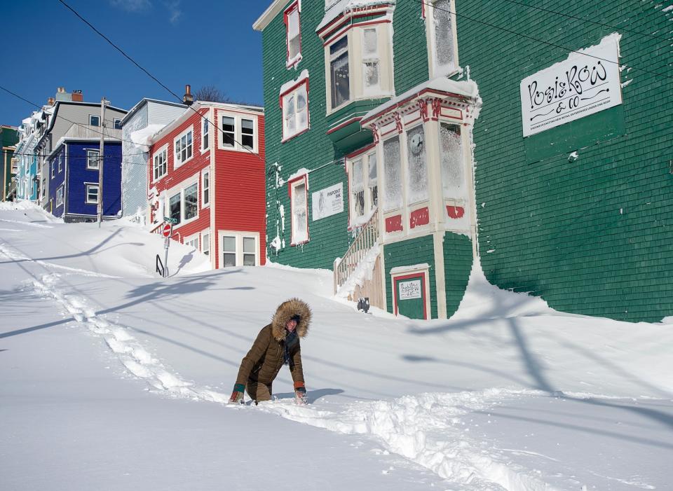 A resident battles their way through the snow in St. John's, Newfoundland (AP)