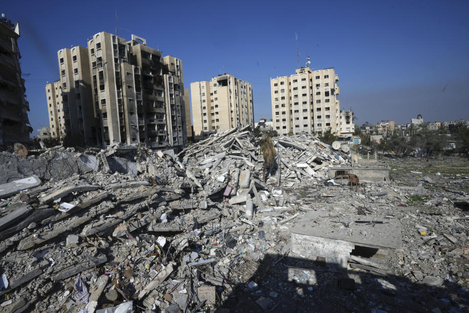 A destruction from the Israeli bombardment is seen in the Nusseirat refugee camp in Gaza Strip, Friday, Jan. 19, 2024. (AP Photo/Adel Hana)