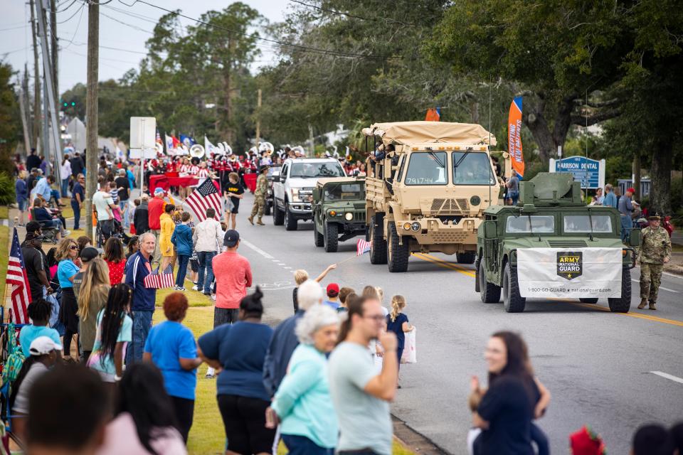 The Panama City Veterans Day Parade includes dozens of patriotically themed golf carts.