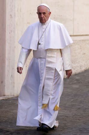 Pope Francis arrives for a lunch with the poor following a special mass to mark the new World Day of the Poor in Paul VI's hall at the Vatican, November 19, 2017. REUTERS/Max Rossi