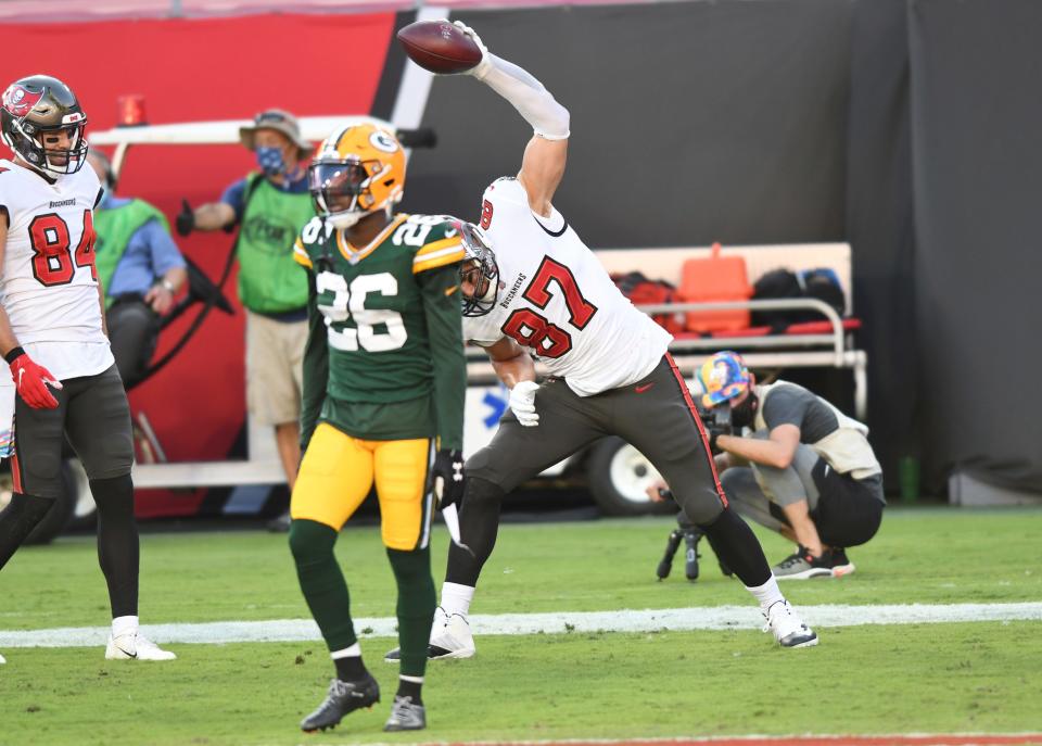 Tampa Bay Buccaneers tight end Rob Gronkowski spikes the ball after scoring against the Green Bay Packers during their October 2020 game in Tampa, Fla.