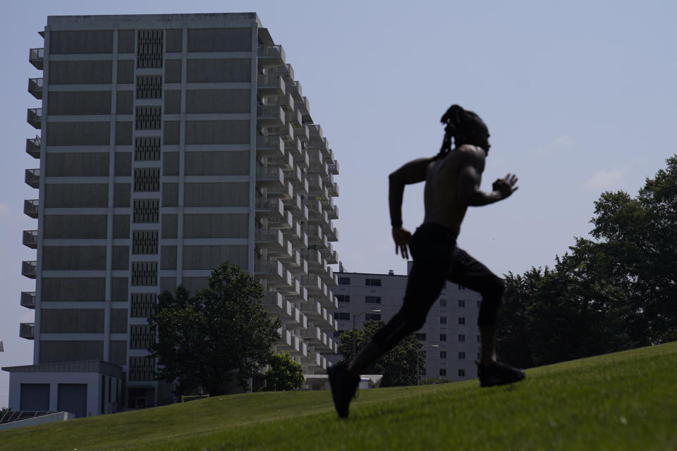 Brian Jones runs sprints up Capitol Hill as he works out in the heat, Friday, June 30, 2023 in Nashville, Tenn. Weather forecasts call for heat indexes to reach over 105 degrees Fahrenheit for the Middle Tennessee area through the weekend. (AP Photo/George Walker IV)