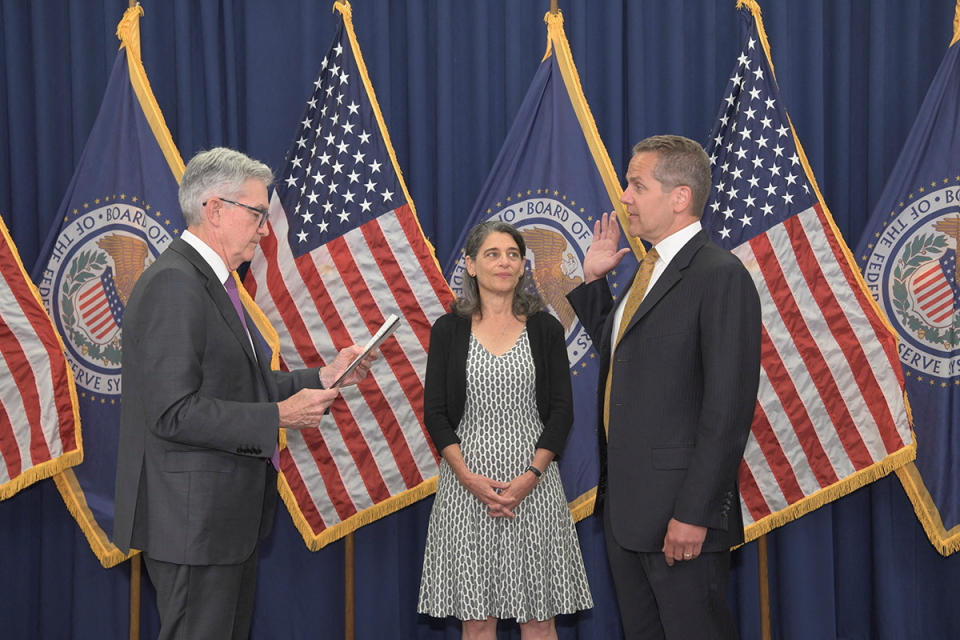 Michael Barr is sworn as Federal Reserve Vice Chair for Supervision by U.S. Federal Reserve Chairman Jerome Powell in the press briefing room of the William McChesney Martin Federal Reserve Board Building in Washington, U.S. July 19, 2022.  U.S. Federal Reserve Board/Handout via REUTERS    THIS IMAGE HAS BEEN SUPPLIED BY A THIRD PARTY