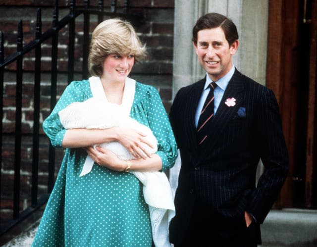 Diana and Charles show off their newborn son William in June 1982 (PA)