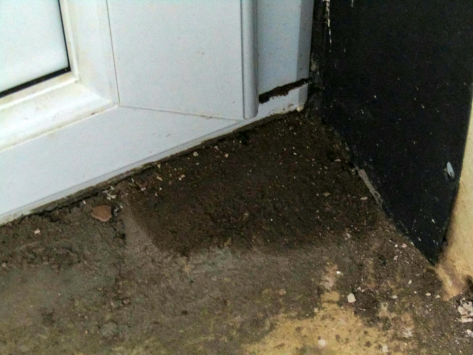 The couple said the builders also urinated against an outside wall. (SWNS)