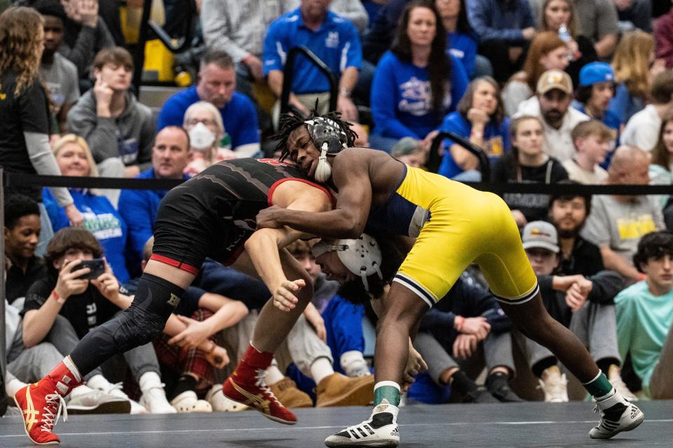 Sussex Central Malachi Stratton, at right, wrestles Red Lion Christian Academy freshman Tye Bellarin to win during the 1st Place Match of the 113 pounds championship finals of the DIAA Individual Wrestling State Tournament at Cape Henlopen High in Lewes, Saturday, March 4, 2023.
