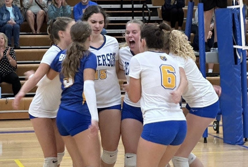Jefferson's volleyball team celebrates after winning a point against Airport Wednesday. The Bears lost the first two sets before rallying to win 18-25, 16-25, 27-25, 25-13, 15-9.