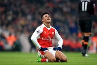 <p>Alexis Sanchez cannot believe how he missed </p>