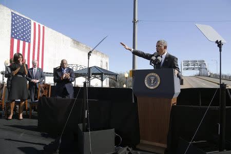 U.S. President Barack Obama delivers remarks at the Edmund Pettus Bridge in Selma, Alabama, March 7, 2015. REUTERS/Jonathan Ernst