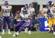 September 27, 2018; Los Angeles, CA, USA; Minnesota Vikings running back Latavius Murray (25) runs the ball against the Los Angeles Rams during the first half at the Los Angeles Memorial Coliseum. Mandatory Credit: Gary A. Vasquez-USA TODAY Sports