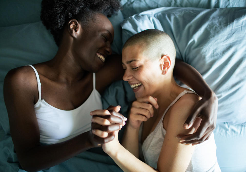 Close up of a Young female couple in a bed in the bedroom