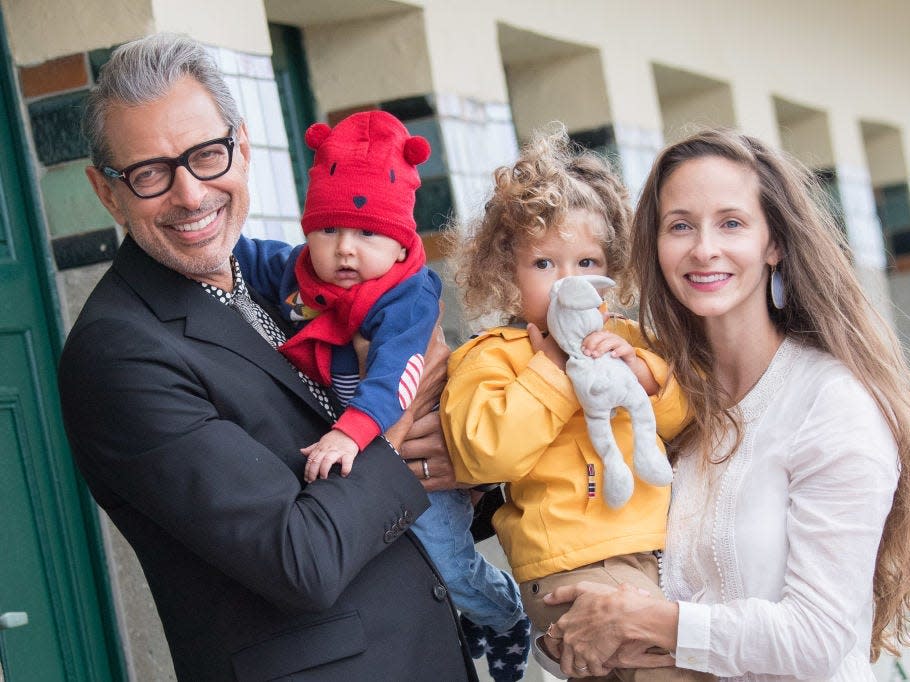 Jeff Goldblum and wife Emilie Livingston hold their sons.