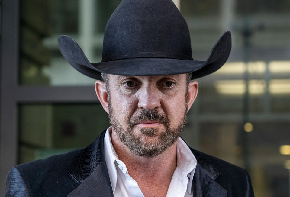 Otero County Commissioner Couy Griffin leaves the federal court in Washington on March. 21, 2022. (Gemunu Amarasinghe / AP file)