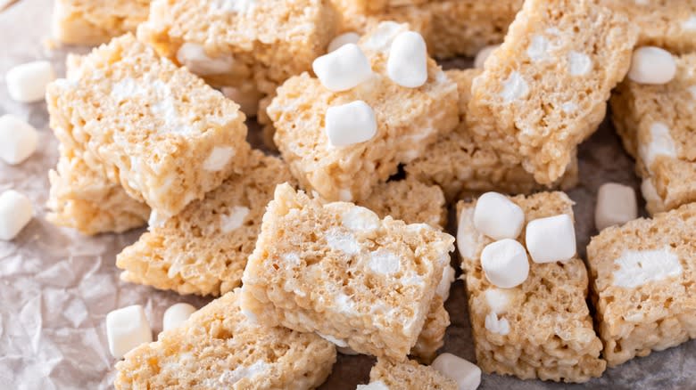 Rice Krispies treats on plate with marshmallow toppers