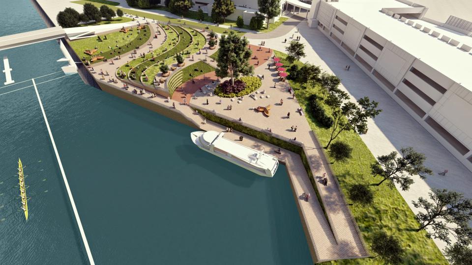  A rendering shows a new riverboat landing, community gathering space and pedestrian bridge planned at the OKANA development on the Oklahoma River.