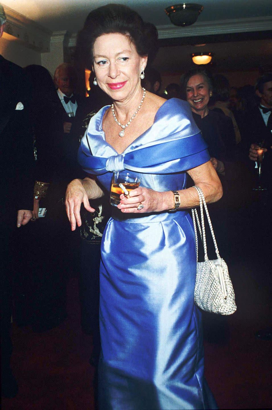 <p>Princess Margaret celebrates the Richmond Theatre refurbishment in a blue gown in 1991.</p>