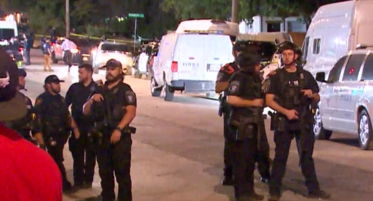 Police arrive on the scene of a deadly shooting late Monday, July 3, 2023 in Forth Worth, Texas.  Authorities say  gunfire erupted following a local festival in the Como neighborhood in the city's southwest.  (WFAA via AP) ((WFAA via AP))