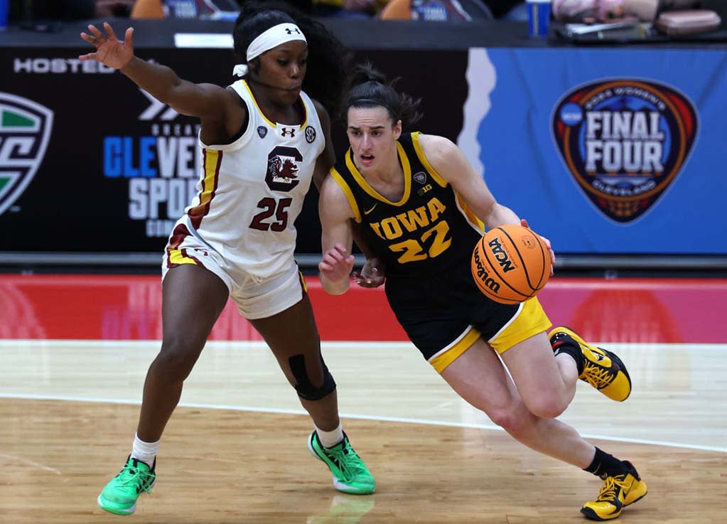  Iowa star Caitlin Clark (r.) may have come up short in the national championship game against South Carolina, but her star power has drawn more viewers to women's sports. . 