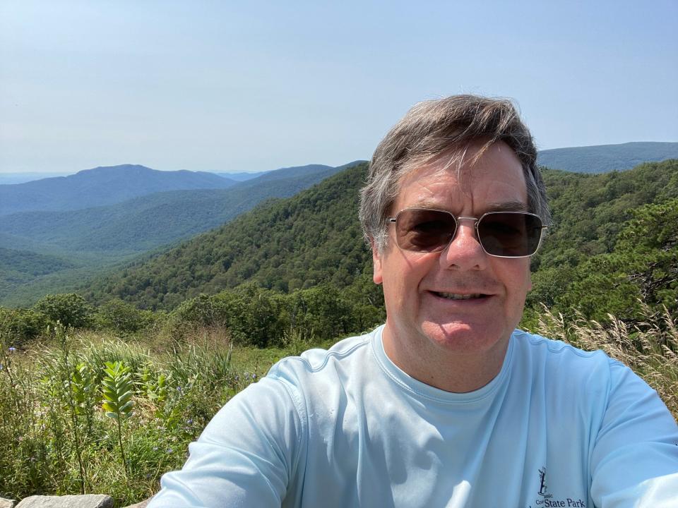 Joel Hough, 56, enjoys a short hike at Hawksbill Mountain, Virginia.