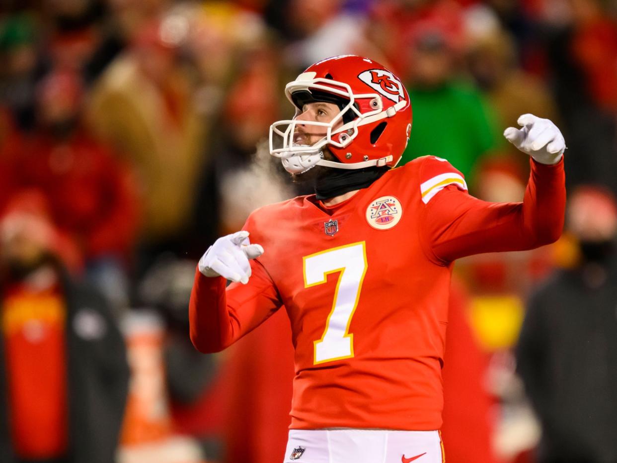 Harrison Butker watches his kick sail through the uprights at the AFC Championship.