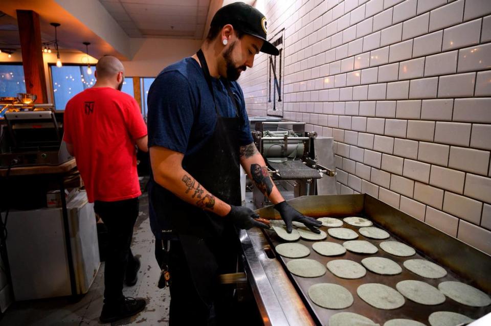 Cook Dustin Miller makes housemade tortillas, Tuesday, July 2, 2019. This week’s “You Gotta Try This” showcases the chicharron taco at Nixtaco in Roseville made with pork belly in a great sauce with lime-pickled onions in a homemade tortilla.