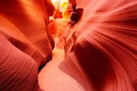 <p><a href="https://www.antelopecanyon.com/" rel="nofollow noopener" target="_blank" data-ylk="slk:Antelope Canyon;elm:context_link;itc:0;sec:content-canvas" class="link ">Antelope Canyon</a> can be recognized from Microsoft and Apple desktop backgrounds, as well as where Britney Spears shot her music video for <a href="https://www.youtube.com/watch?v=IlV7RhT6zHs" rel="nofollow noopener" target="_blank" data-ylk="slk:“I’m Not a Girl, Not Yet a Woman.”;elm:context_link;itc:0;sec:content-canvas" class="link ">“I’m Not a Girl, Not Yet a Woman.”</a> </p><p>The canyon is split between upper and lower levels, and unless you’re visiting for more than a day you can only visit one. Visitation requires months of preparation and purchasing tickets, as this is located on Navajo land. </p><p>The canyon looks totally different depending on the time of day, and there are tour groups for advanced photographers too. </p>
