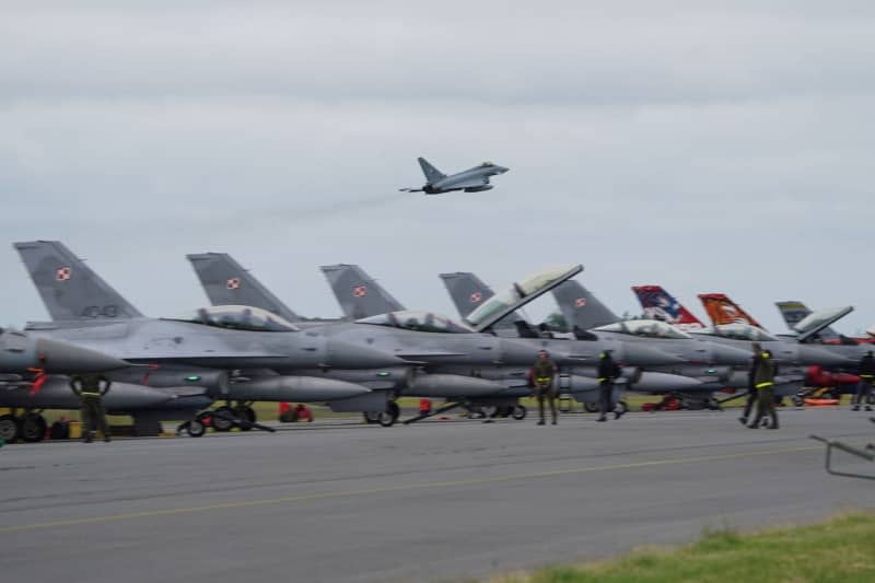 A fighter jet takes off from the Tactical Air Force Wing 51 airfield "Immelmann" during NATO "Tiger Meet" air force exercises.  The international exercise in Jagel will involve approximately 60 fighter jets and helicopters from 11 NATO countries, along with participants from Switzerland and Austria.  Marcus Brandt/dpa