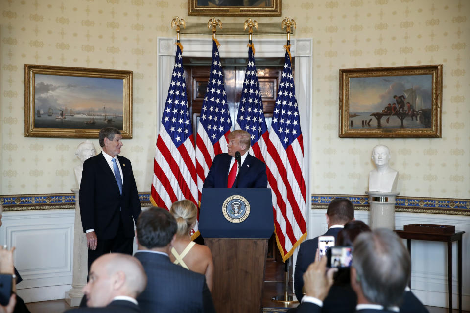 President Donald Trump speaks during an event to present the Presidential Medal of Freedom to Jim Ryun, left, in the Blue Room of the White House, Friday, July 24, 2020, in Washington. (AP Photo/Alex Brandon)