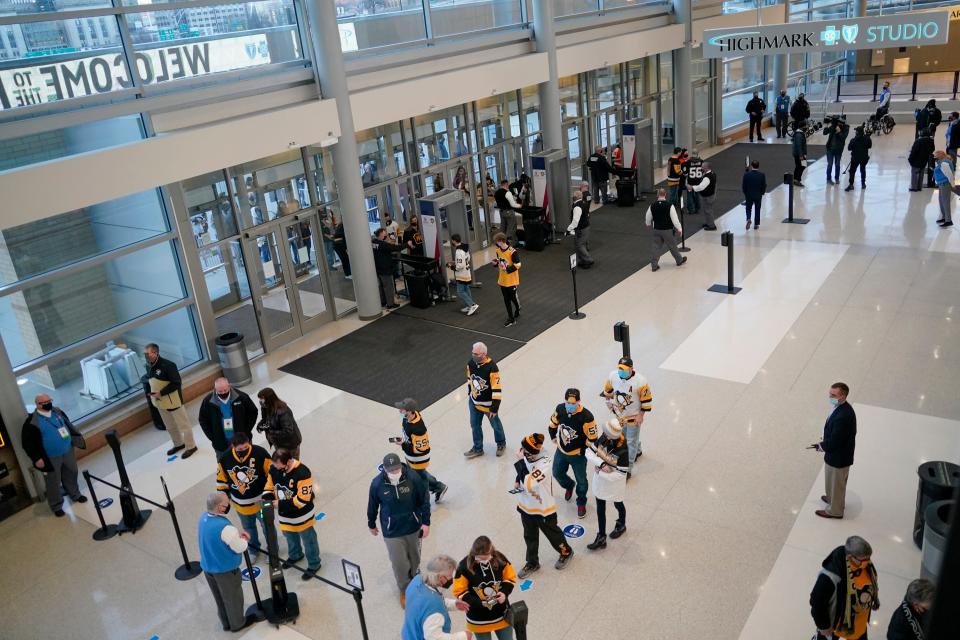 Pittsburgh Penguins fans arrive at PPG Paints Arena on Tuesday for the first time this season.