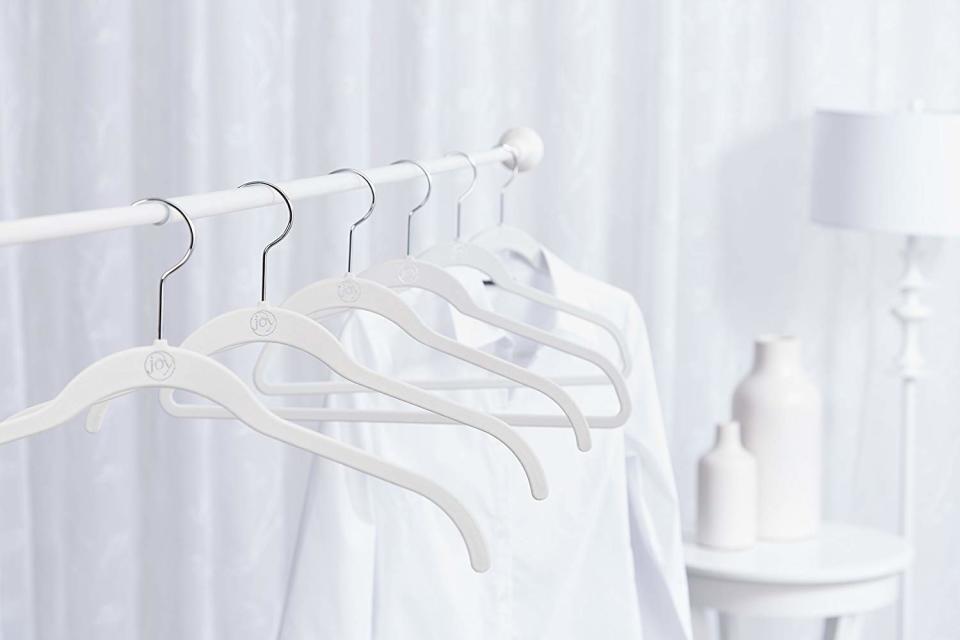 Matching velvet hangers bring calm where once there was chaos (Photo: Amazon)