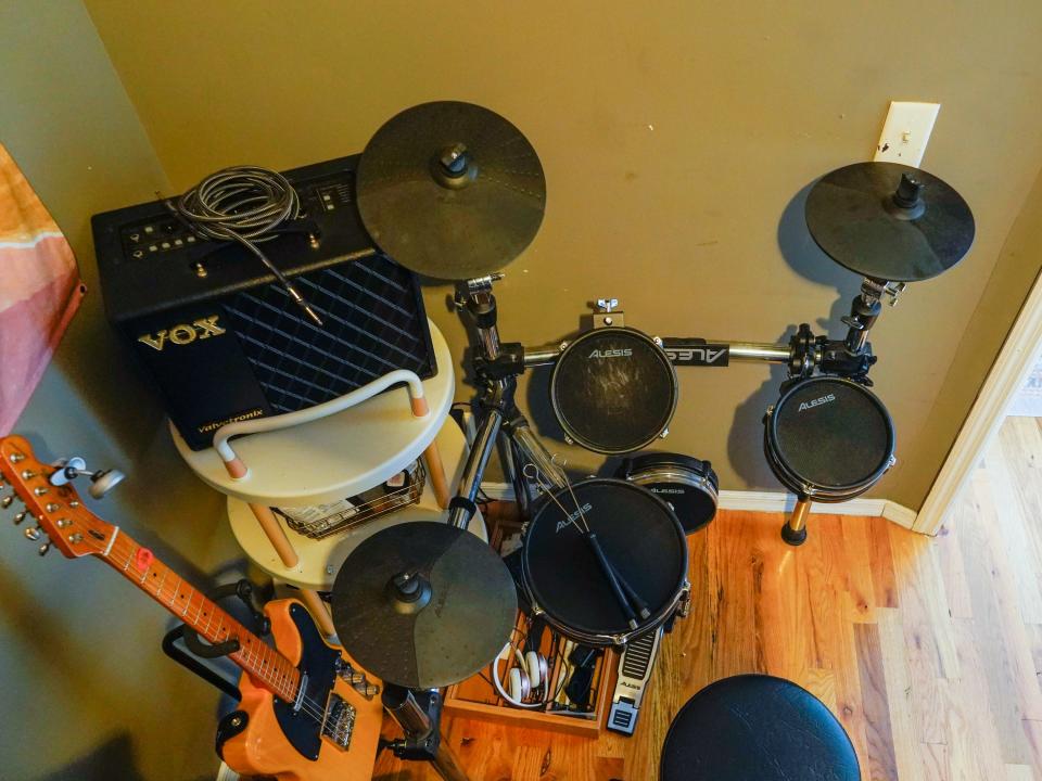 The author's electric drum kit in her home