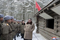 This undated photo provided on Wednesday, Dec. 4, 2019, by the North Korean government shows North Korean leader Kim Jong Un, right, speaks to lieutenants as he visits Mount Paektu area, North Korea. North Korea says leader Kim has taken a second ride on a white horse to a sacred mountain in less than two months. Independent journalists were not given access to cover the event depicted in this image distributed by the North Korean government. The content of this image is as provided and cannot be independently verified. Korean language watermark on image as provided by source reads: "KCNA" which is the abbreviation for Korean Central News Agency. (Korean Central News Agency/Korea News Service via AP)