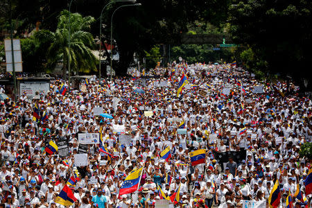 Demonstrators attend a women's march to protest against President Nicolas Maduro's government in Caracas, Venezuela, May 6, 2017. REUTERS/Carlos Garcia Rawlins