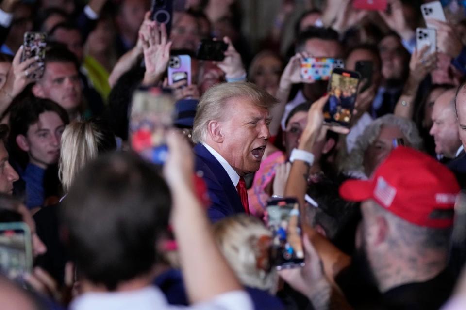 Former President Donald Trump arrives to speak at his Mar-a-Lago estate hours after being arraigned in New York City (AP)