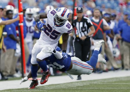 Aug 20, 2016; Orchard Park, NY, USA; New York Giants free safety Landon Collins (21) dives to try and tackle Buffalo Bills running back LeSean McCoy (25) as he runs the ball during the first half at New Era Field. Mandatory Credit: Timothy T. Ludwig-USA TODAY Sports / Reuters Picture Supplied by Action Images