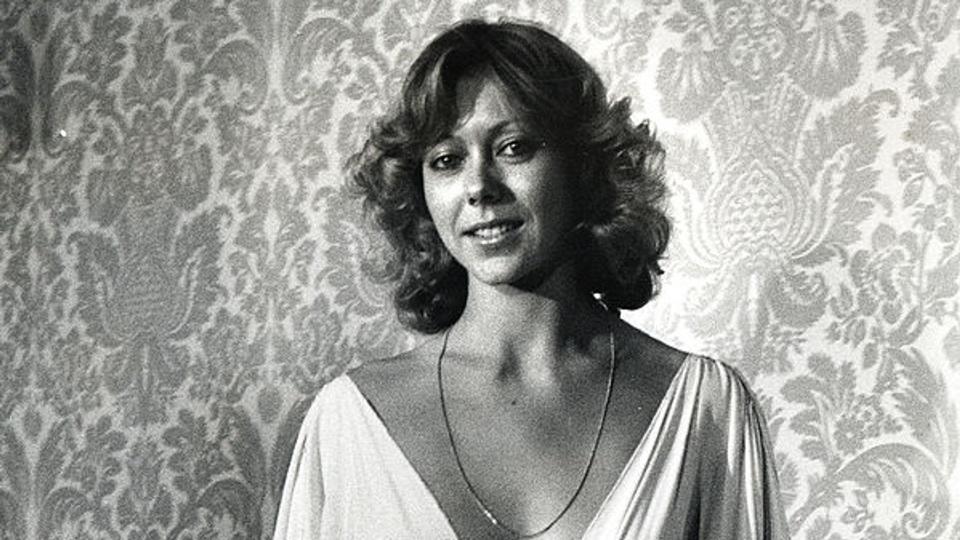 Jenny Agutter wearing a plunging white gown in 1978 