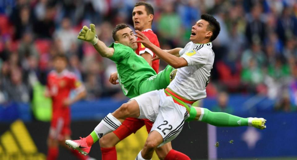 Mexico's Hirving Lozano (22) scored the game-winning goal thanks to Igor Akinfeev's second goalkeeping blunder of the match. (Sporting News)