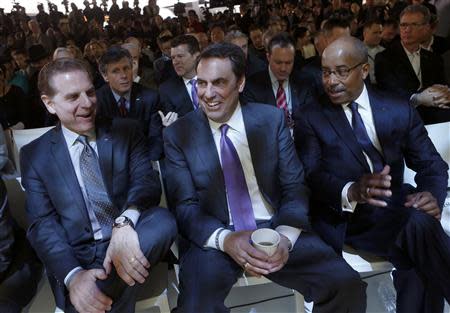 (L-R) Dave Leone, Chief Engineer for Cadillac; Mark Reuss, GM President of North America; and Ed Welburn, VP of GM Global Design, attend the Cadillac presentation during the press preview day of the North American International Auto Show in Detroit, Michigan January 14, 2014. REUTERS/Rebecca Cook
